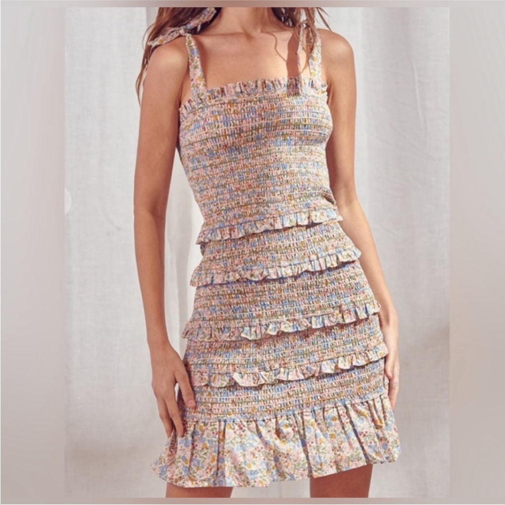 Storia floral smocked mini dress with tie straps and tiered ruffles